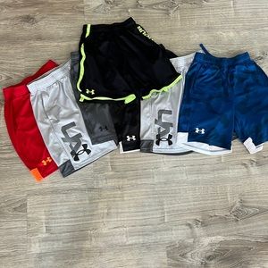 (7) pairs of Under Armour shorts boys size med